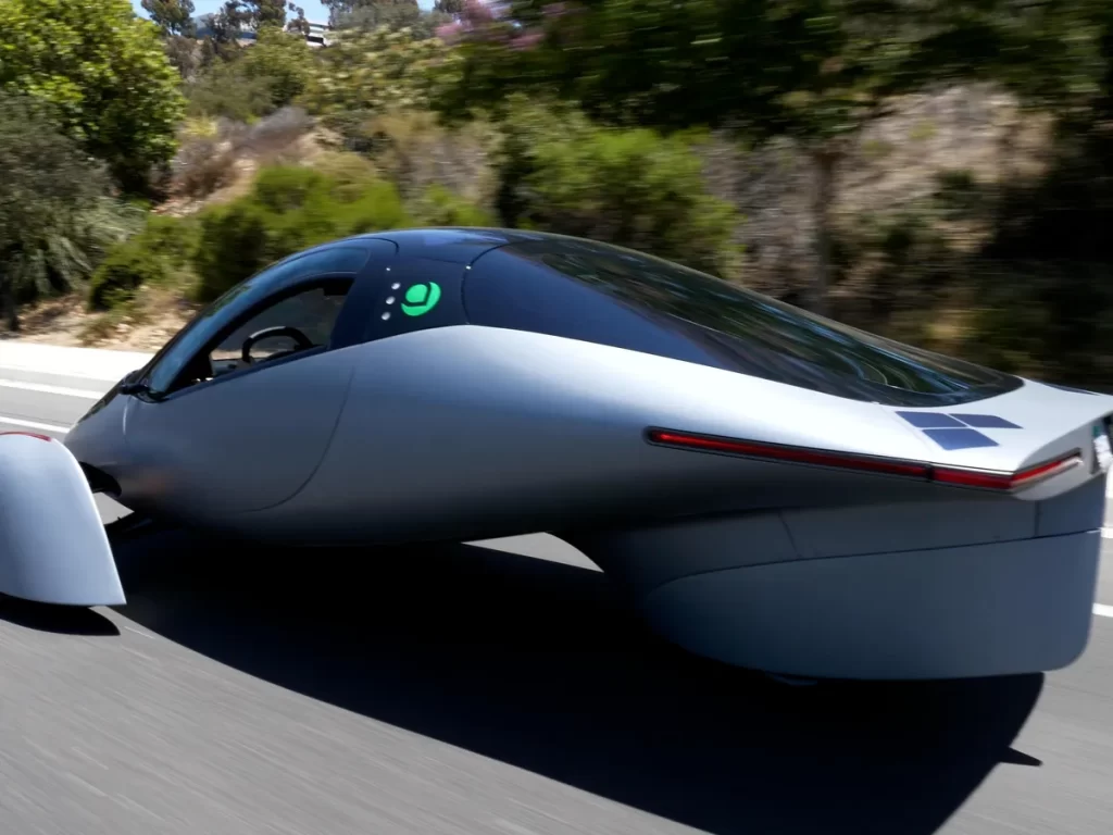 Riding in a solar powered electric vehicle that also serves a camper