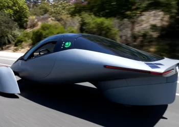 Riding in a solar powered electric vehicle that also serves a camper