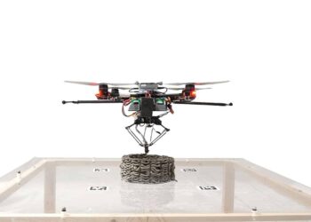 Buildings constructed by a drone swarm that 3D prints cement