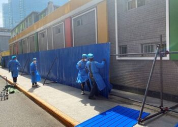 Rising China COVID cases force school closures, Beijing