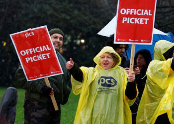 Travelers have warned of delays due to strike by UK passport staff