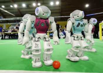 High end 21st century robot can play soccer in grass and mud