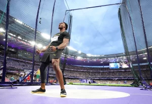 Stona celebrates after breaking the Olympic record